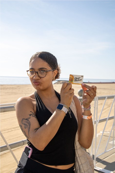 Runner holding Char Tickets after a race
